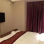 Yichao Apartment Hotel