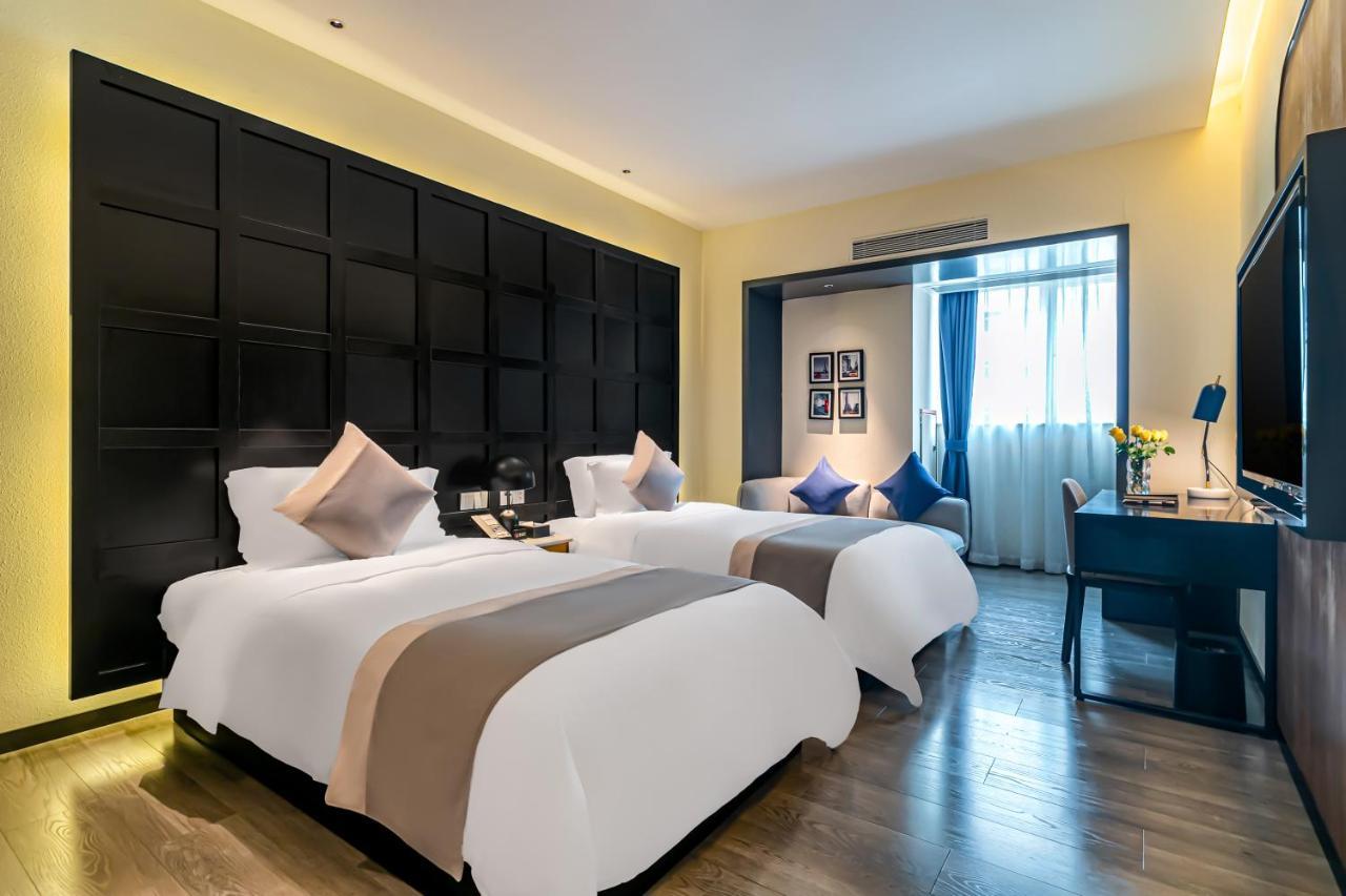 Hotel Empathy - East Railway Station Tianhe Sports Center