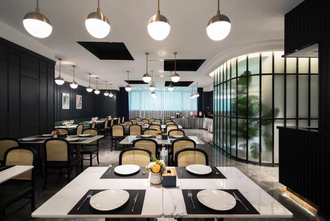 Hotel Empathy - East Railway Station Tianhe Sports Center 4*