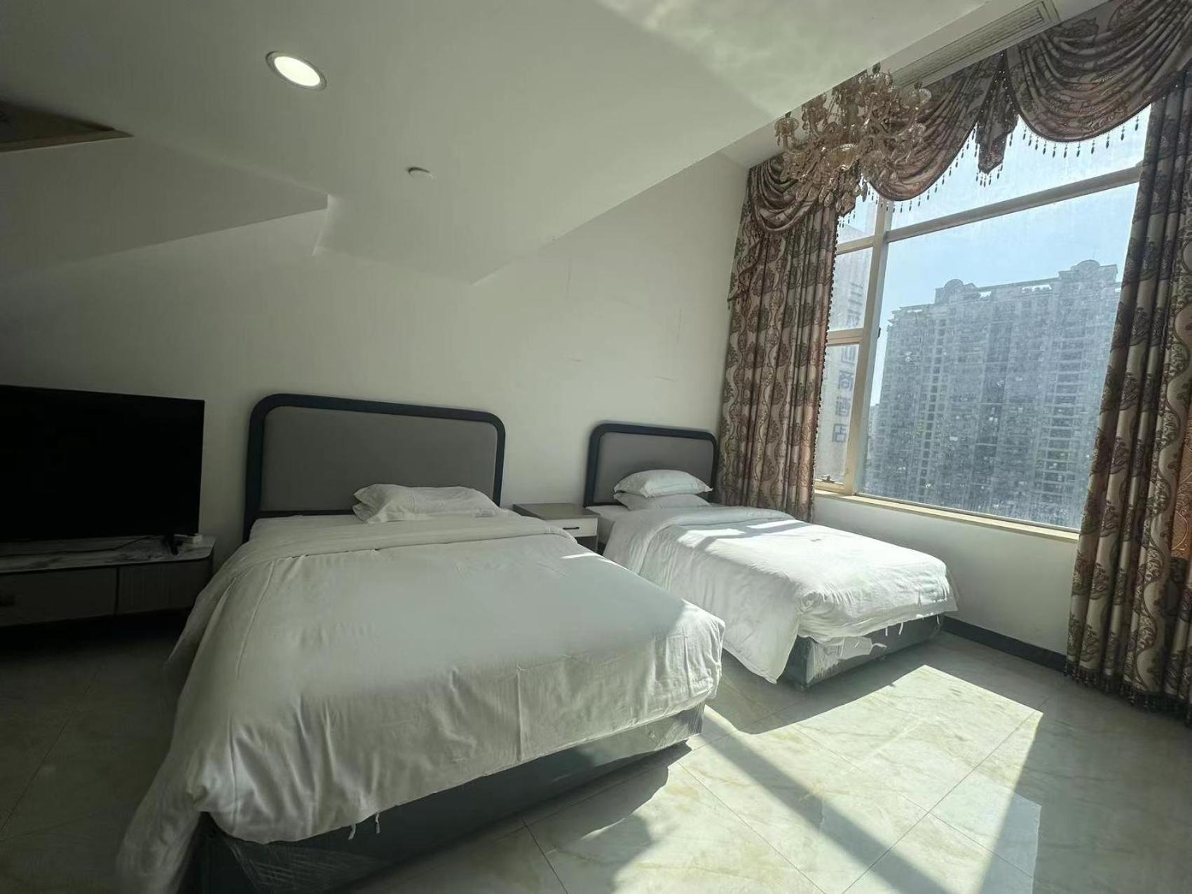 Yoyo International Hotel-the Legend Building-1mins To Line5 Taojin Stn-free Shuttle Bus For Fair Apartemen Guangzhou