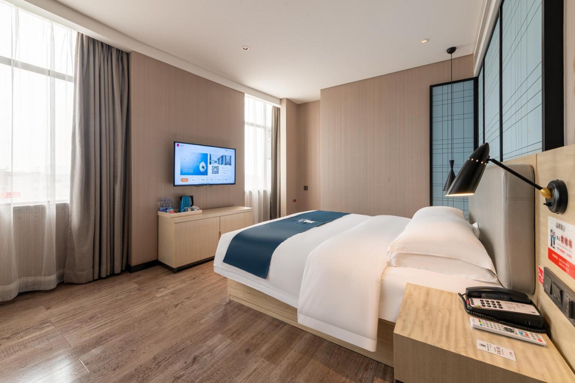 Echarm Jiahe Wanggang Subway Station Branch Hotel