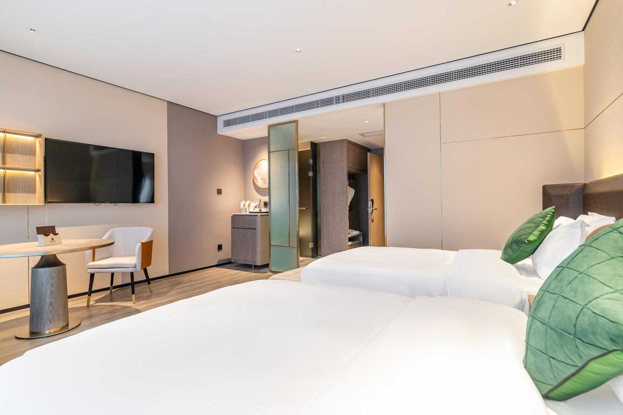 Hotel Jun Ming Happy World Yishang Hotel,