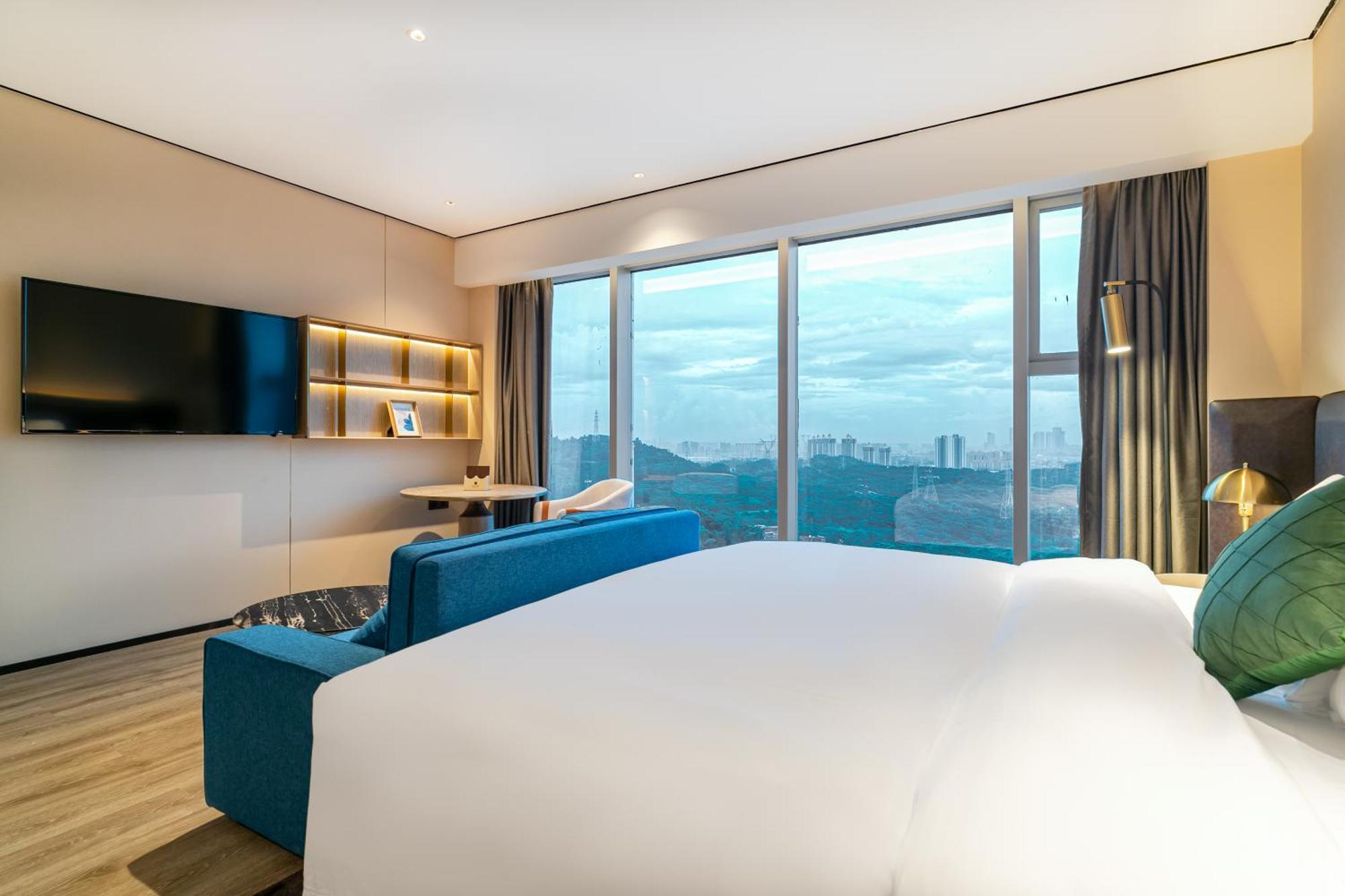 Jun Ming Happy World Yishang Hotel, Hotel 4*