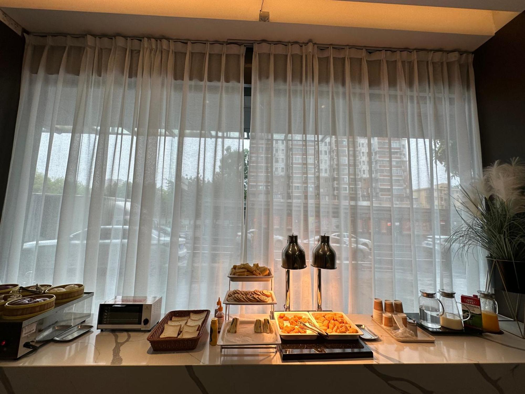 Yizhi - Zhujiang New Town Huashi Subway Station Branch Hotel
