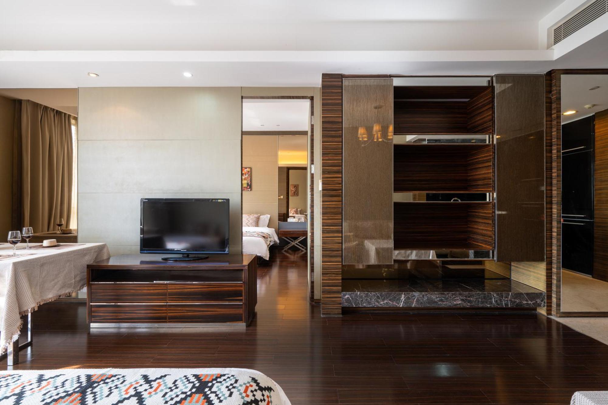 Snug Gaokong Jiangjing Aparthotel 3*