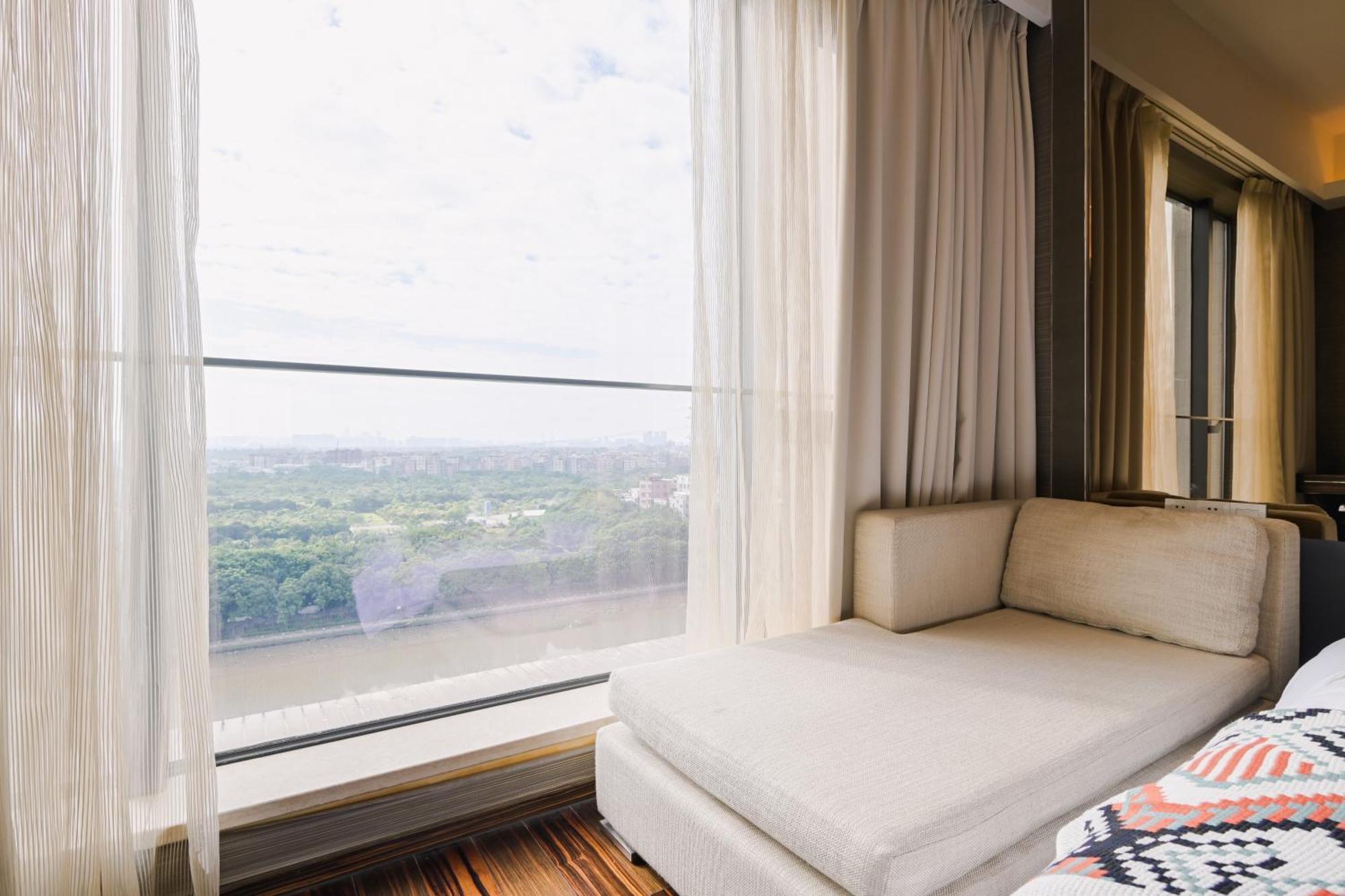 Snug Gaokong Jiangjing Aparthotel 3*