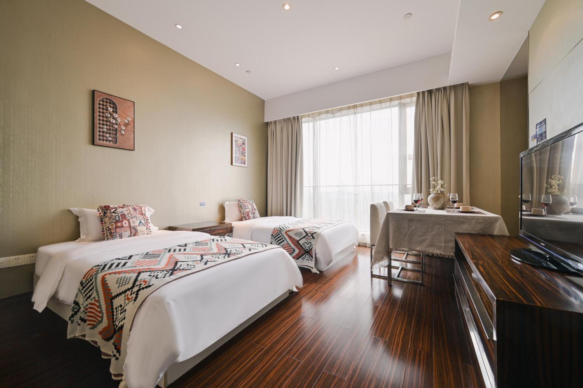 Aparthotel Snug Gaokong Jiangjing