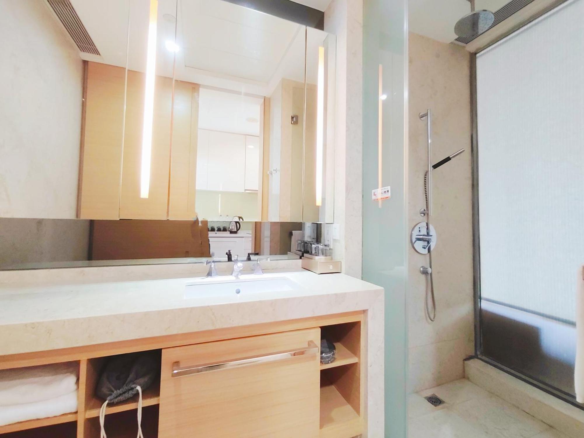 Snug Gaokong Jiangjing Aparthotel 3*