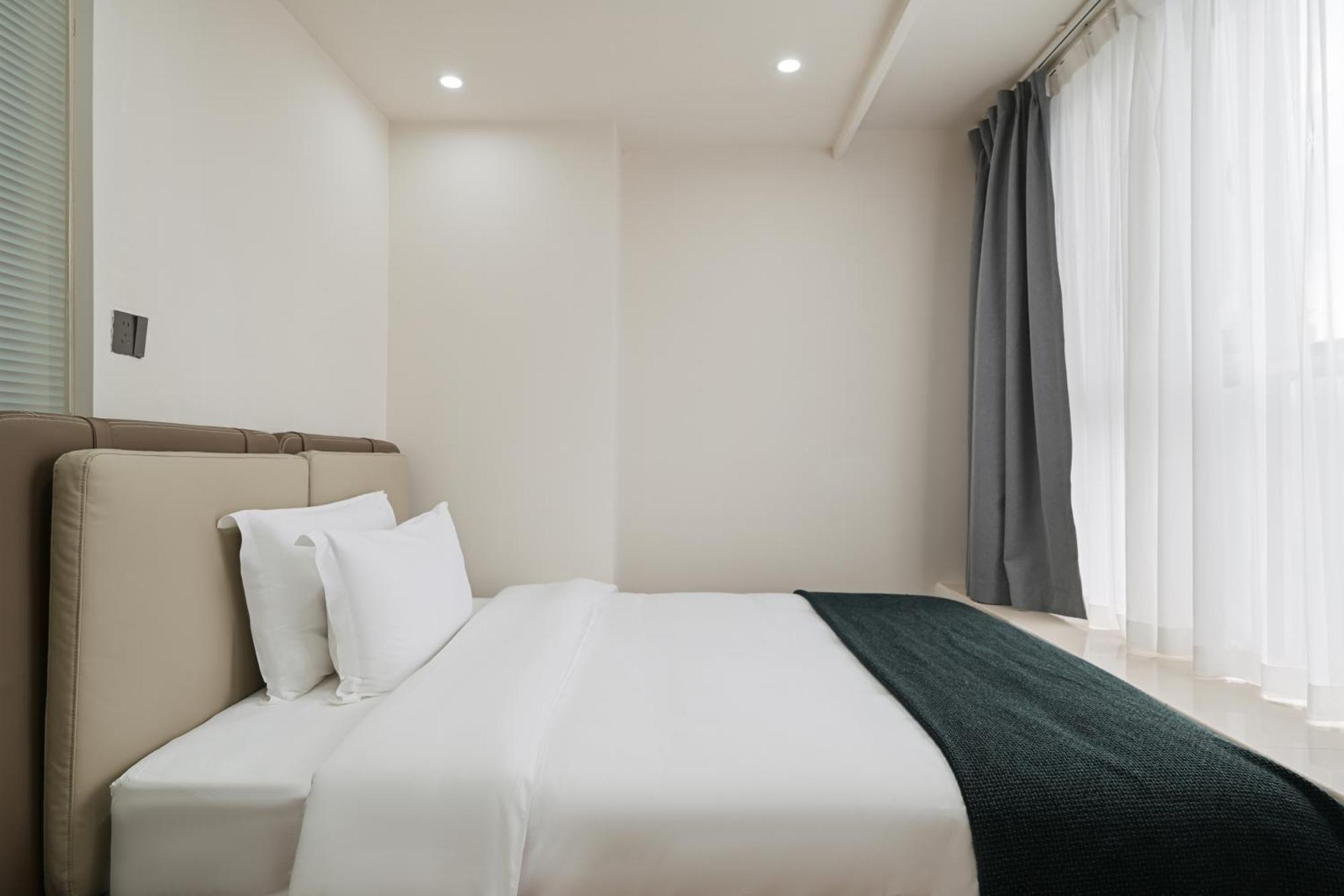 East Maple International - Luogang Wanda Plaza Suyuan Metro Station Aparthotel 2*