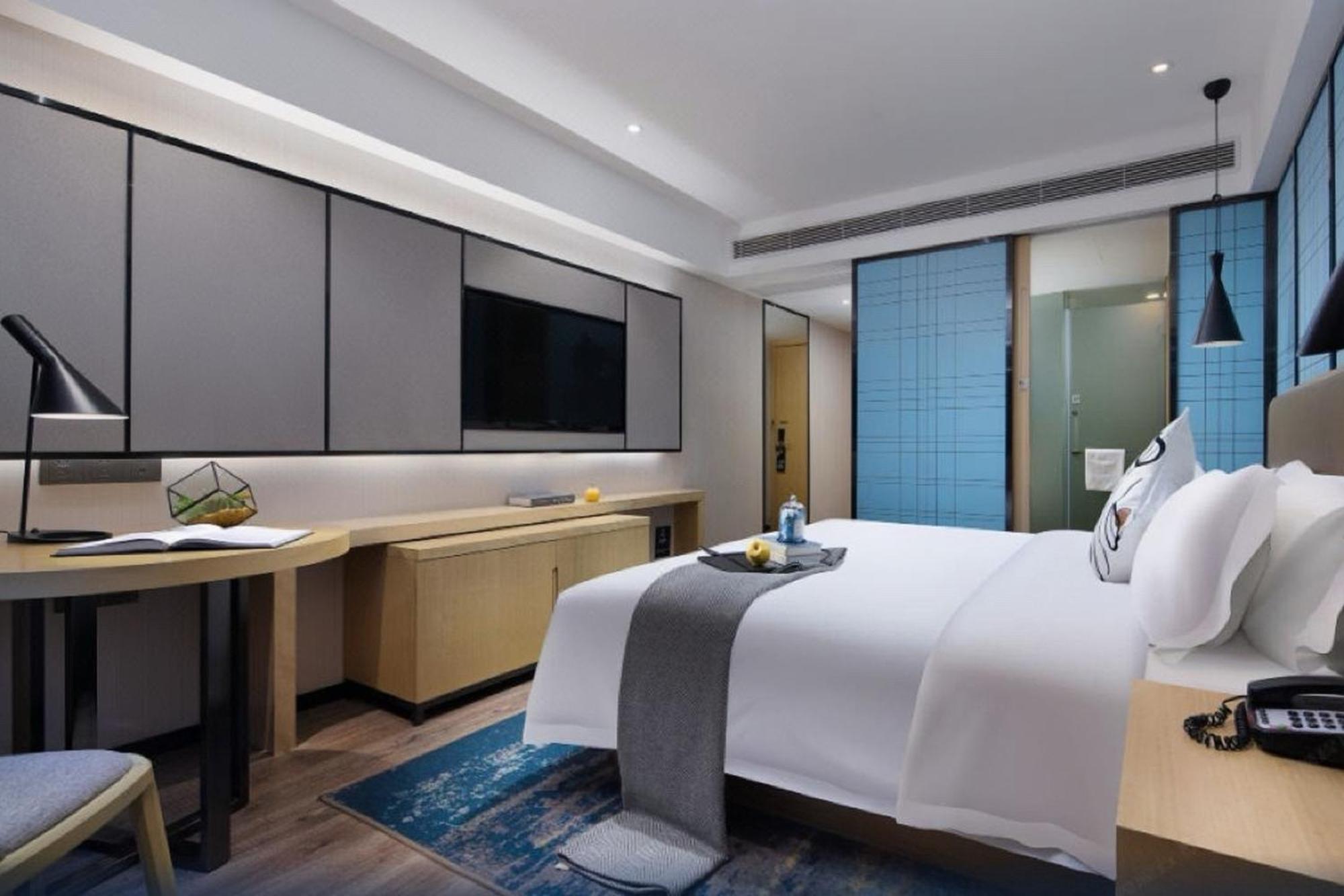 Hotel Echarm International Beijing Road Pedestrian Street Tianzi Wharf Branch - Free Shuttle Bus To Fair Complex During Fair Period