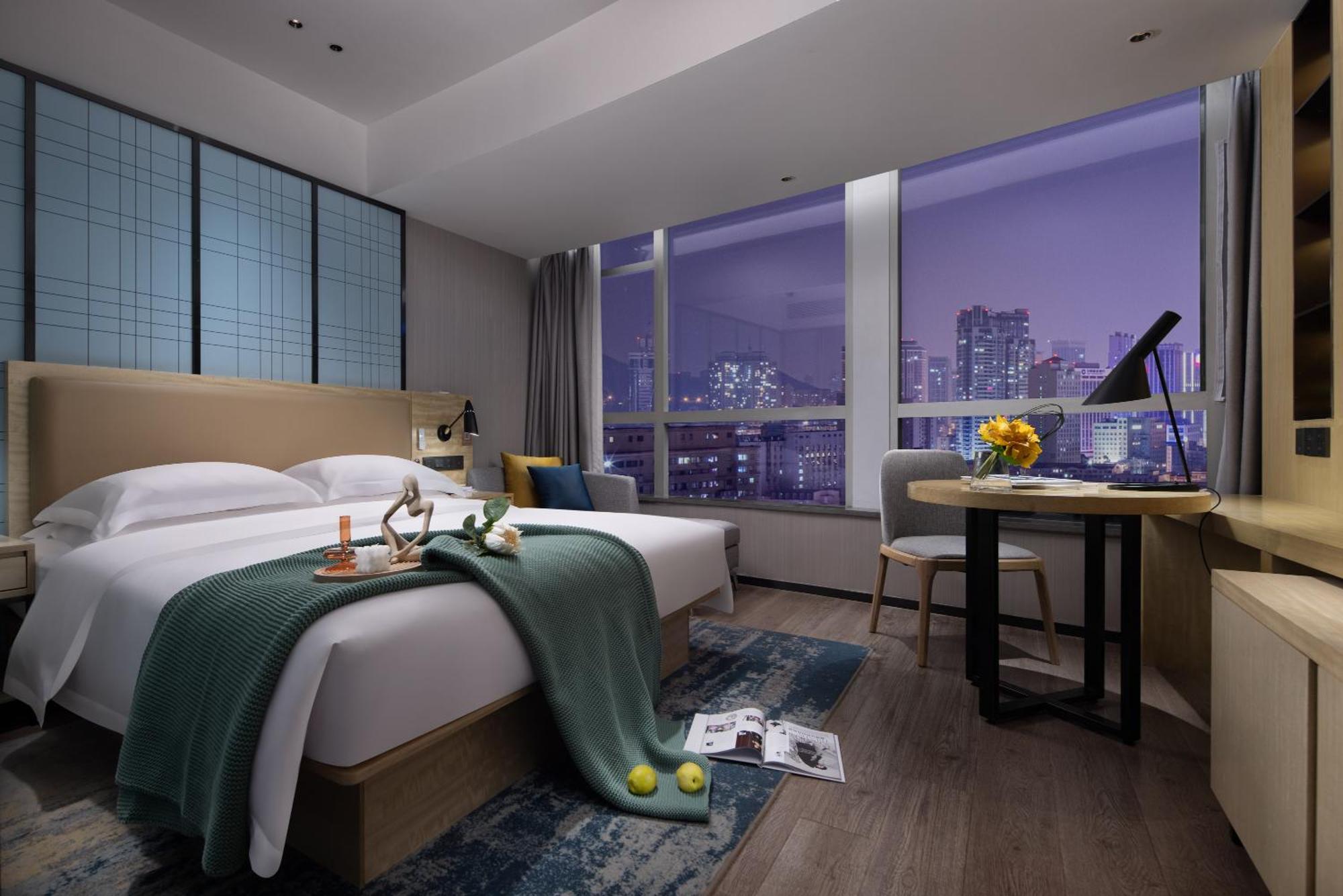 Echarm International Beijing Road Pedestrian Street Tianzi Wharf Branch - Free Shuttle Bus To Fair Complex During Fair Period Hotel