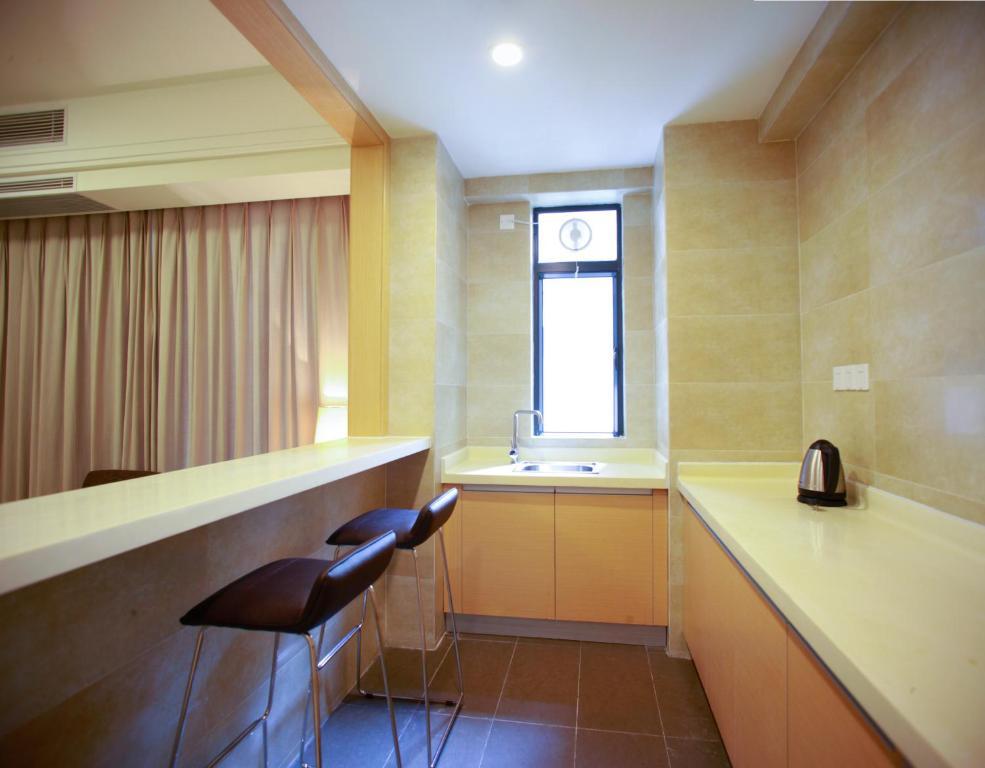 Xcellent International Serviced Aparthotel