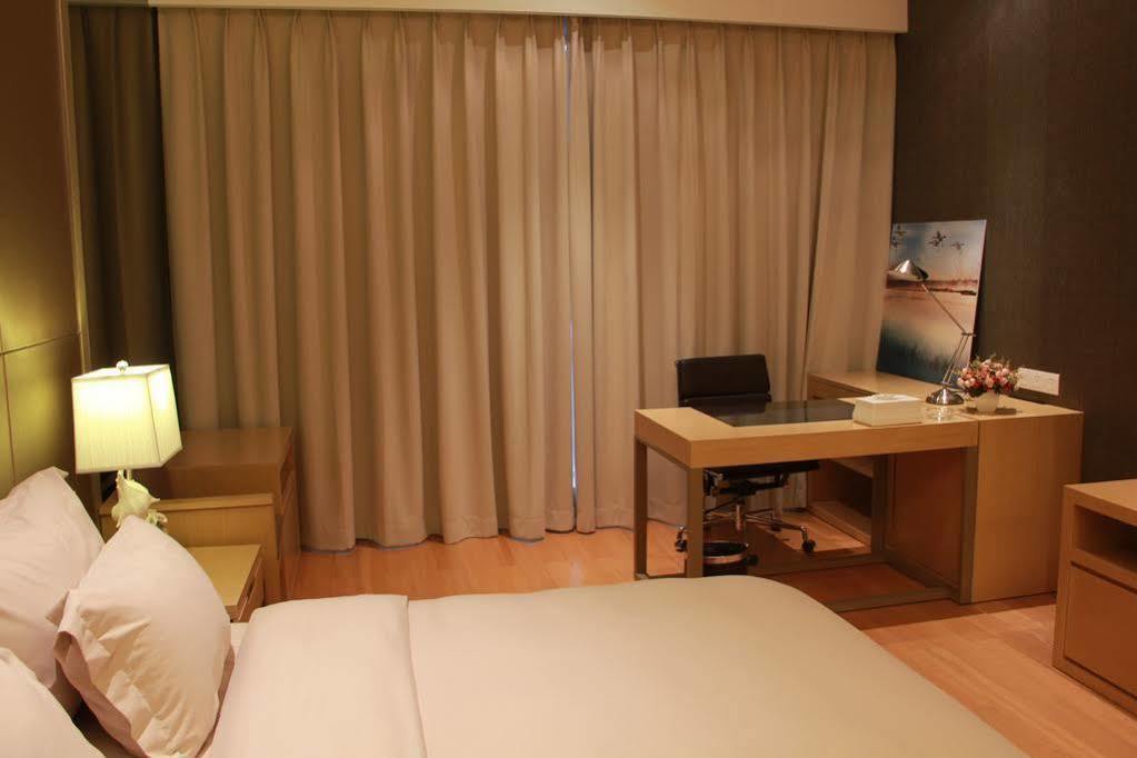 Xing Yi International - Poly World Branch Apartemen