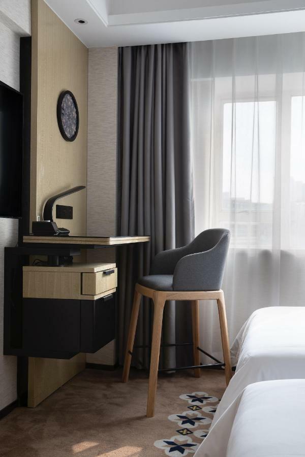 Paco Jiangtai Metro Station Branch Hotel 4*