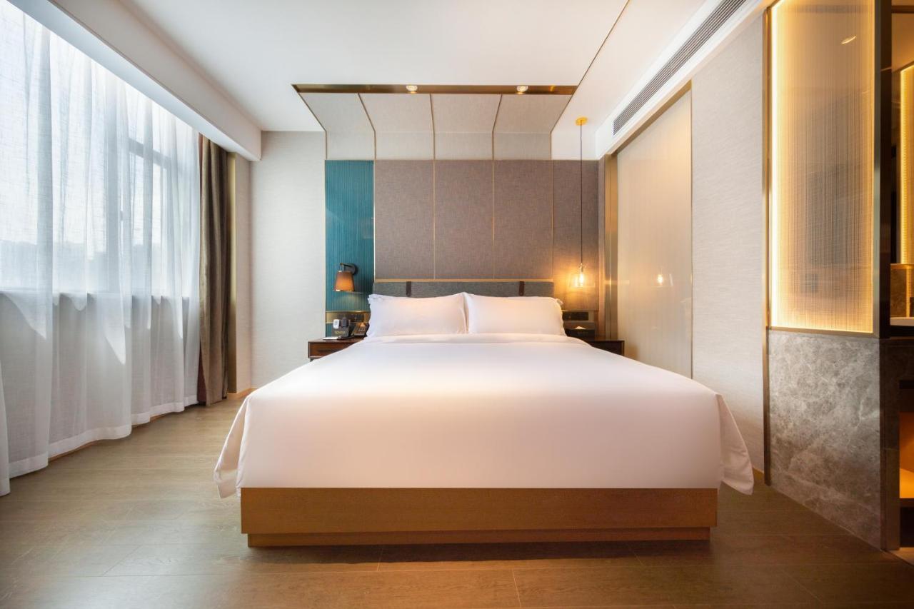 Hotel Paco South Railway Station Panyu Changlong Branch