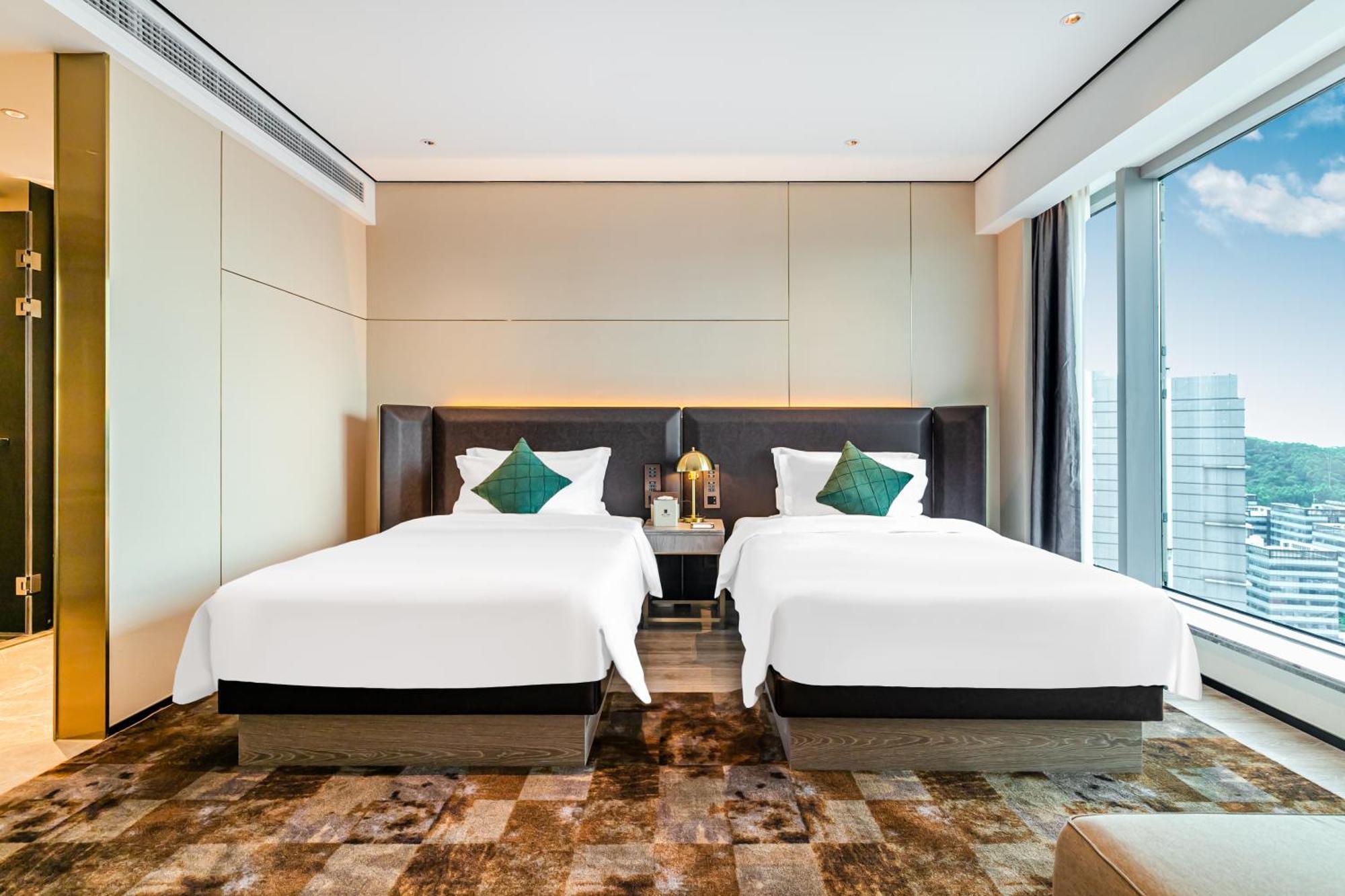 Jun Ming Happy World Yishang Hotel,