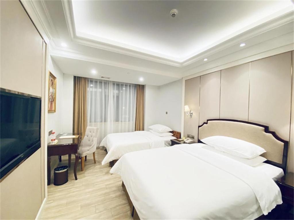 Vienna Baiyun College Jinyuan Plaza Hotel 3*
