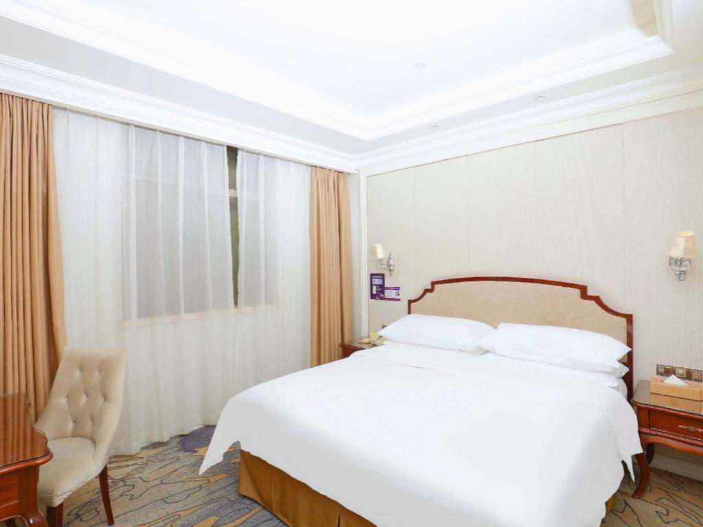 Vienna Baiyun College Jinyuan Plaza Hotel 3*