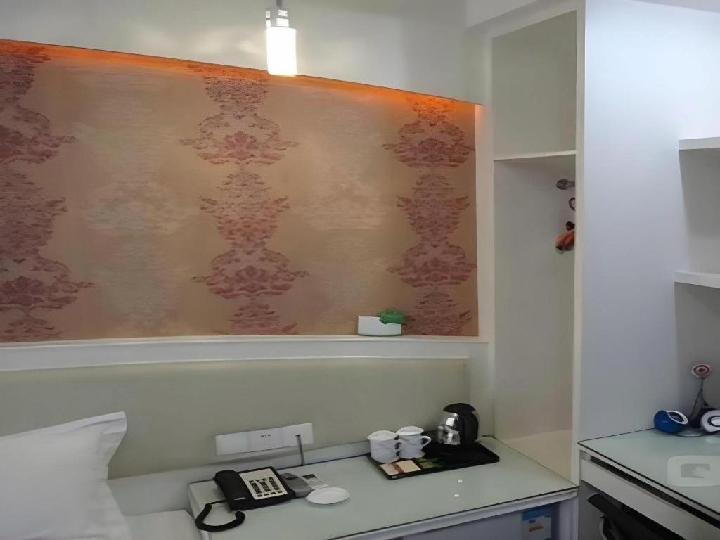 Xinghe Xinfeng Railway Station & Bus Station Branch Hotel