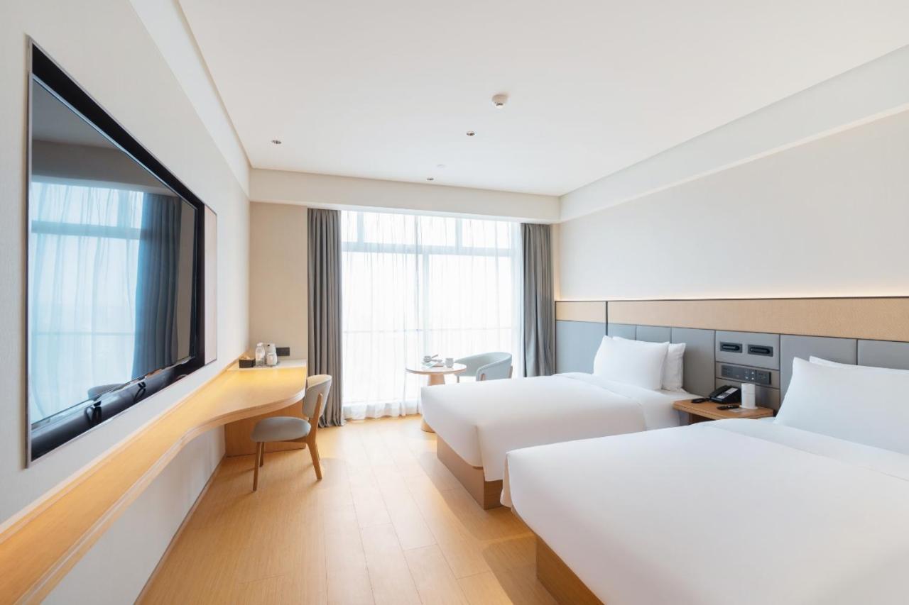 Ji East Railway Station Tianhe Sports Center Hotel