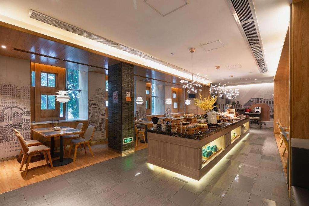 Hotel Orange Tianhe Gangding Metro Station