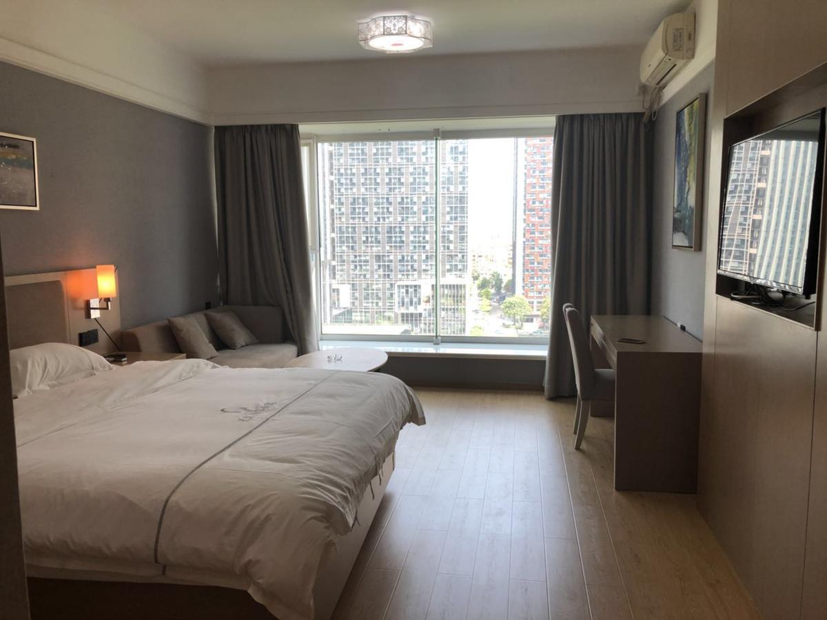 Xinghui International Apartment *